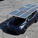 Tesla Owner Builds Solar Array That Folds Out of Model Y Roof