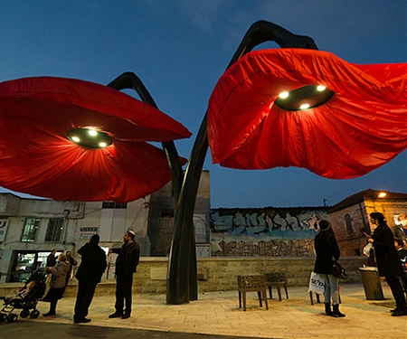 Giant Flowers Bloom as Pedestrians Approach