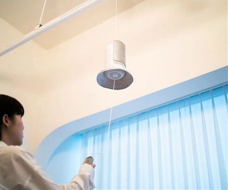 This Air Purifier Hangs From Your Ceiling to Give Light and a Sense of Calm - Abell