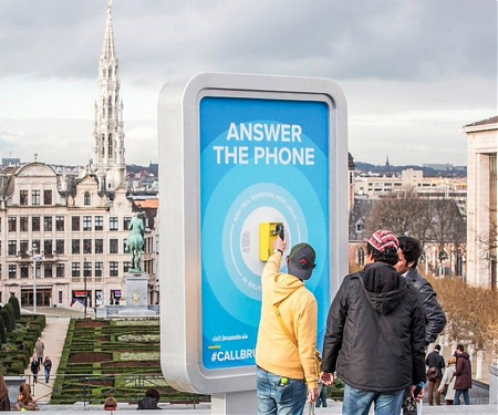 In Brussels, Locals Talk to Visiting Tourists via Public Phones