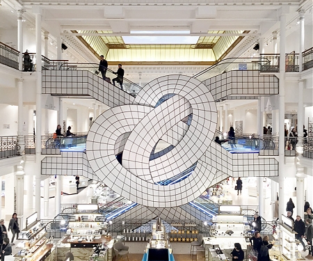 Leandro Erlich Twists Le Bon Marché's Famed Escalator Into Pretzel-like Form