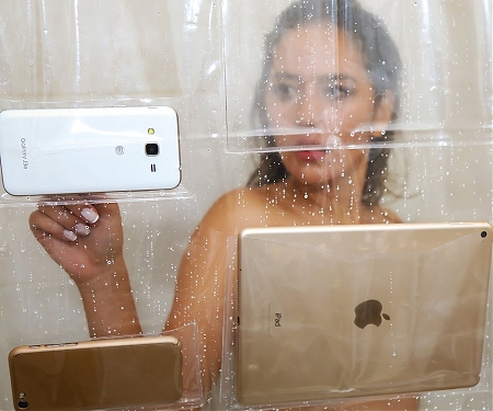 A Shower Curtain That Can Hold Phones And Tablets Is Now A Thing