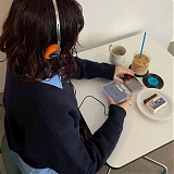 Why Tokyo’s New Cassette Café Treats Friction as a Feature, Not a Flaw