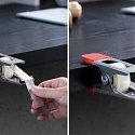 Clothespin-Inspired Tape Dispenser Clamps Right Onto The Side of Your Study Table