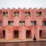 Red-Toned Stucco Surfaces Form Layered Facade for Boutique Hotel by RA! in Mexico