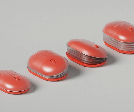 This Ambidextrous Mouse Uses an Accordion-like Design to Give Each Hand a Grip