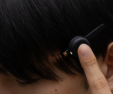 A Reading Light That Actually Clips to Your Hair, Not Your Book