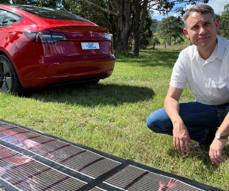 (Video) Rolled-Up Printed Solar Panels to Power Tesla Journey