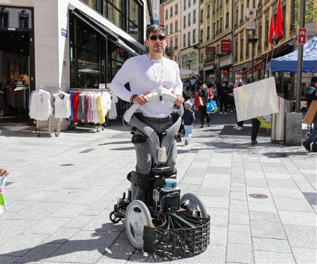 (Video) Control for Wheelchair Robots to Mitigate Risk of Collision in Crowds