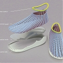 A Therapeutic Shoes to Rehabilitate Developing Feet from Chronic Heel Discomfort