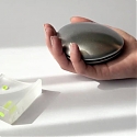 Aluminum And Acrylic Handheld Objects Frame Touch, Weight, And Movement As Design Tools