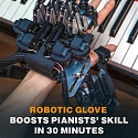 Robotic Exoskeleton Can Train Expert Pianists to Play Faster