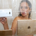A Shower Curtain That Can Hold Phones And Tablets Is Now A Thing